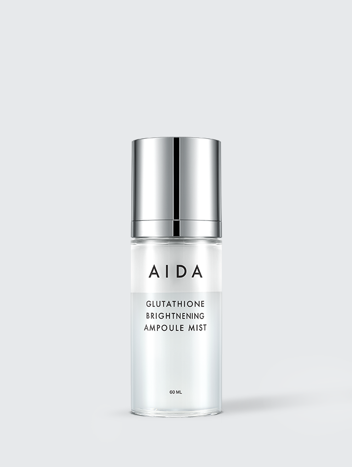 Elegant AIDA Glutathione Brightening Ampoule Mist container showcased in a sleek, modern design with a silver cap and clear body, emphasizing its luxurious and functional skincare packaging.