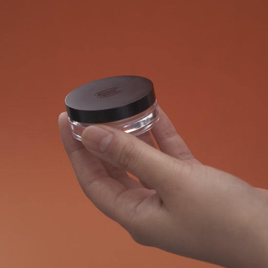 using Fig Scent Balm, showing the application process