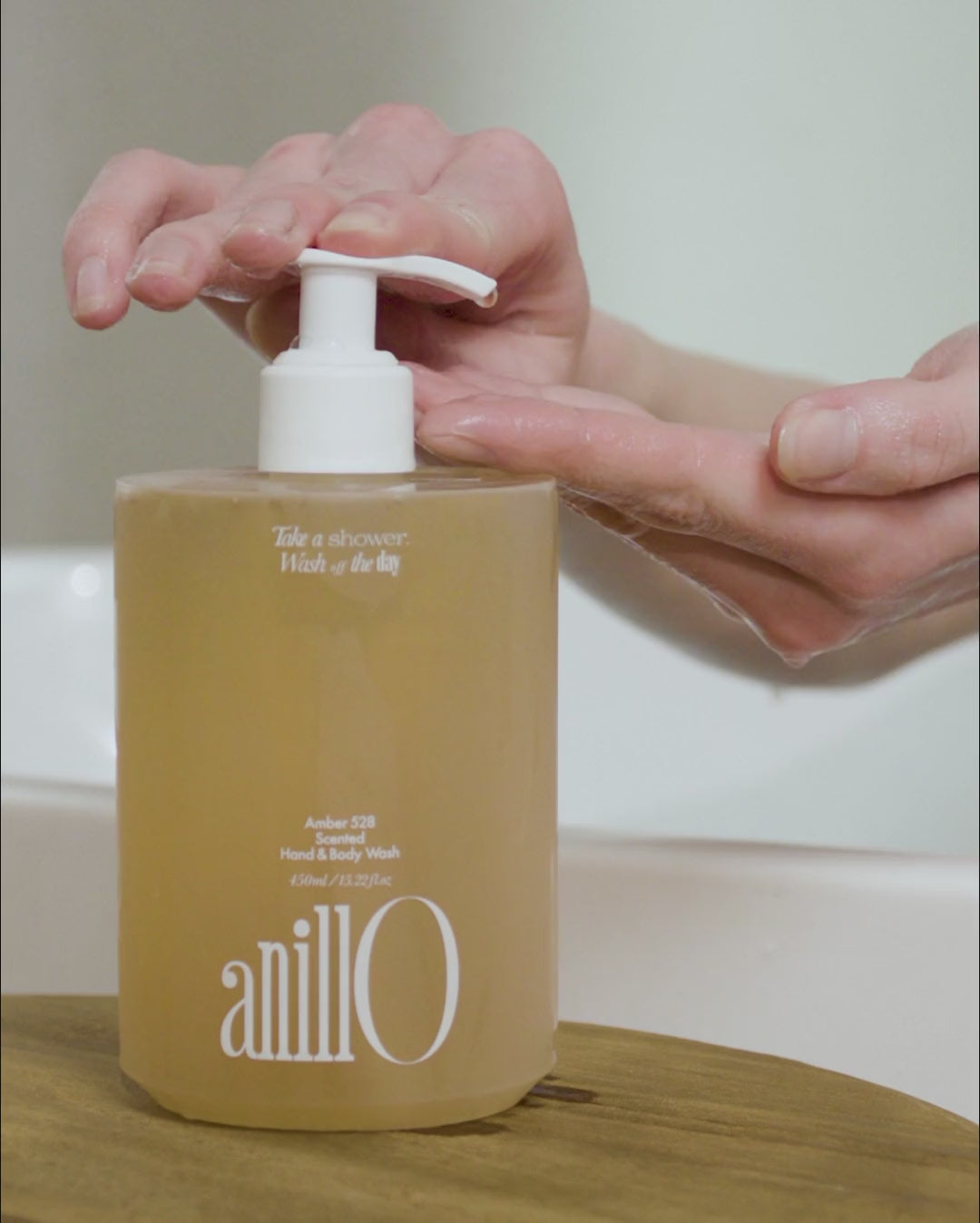 Anillo Amber 528 Scented Hand Cream and Hand & Body Wash bottles next to each other