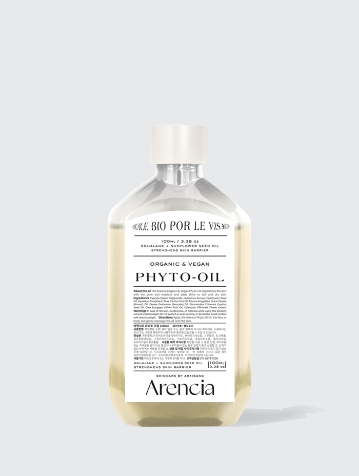  A bottle of Arencia Organic & Vegan Phyto-Oil, featuring 100ml / 3.38oz capacity, formulated with squalane and sunflower seed oil to strengthen the skin barrier